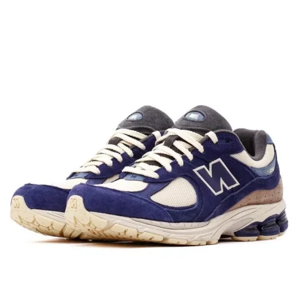 New balance 2002r navy cream 1 600x600