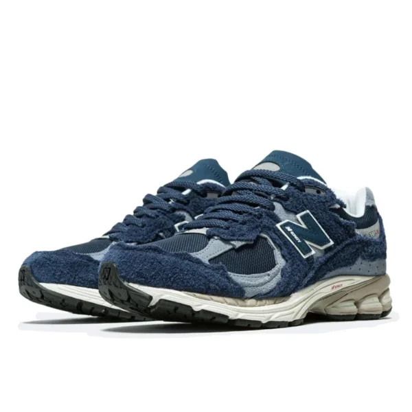 New balance 2002r protection pack navy grey 3 600x600